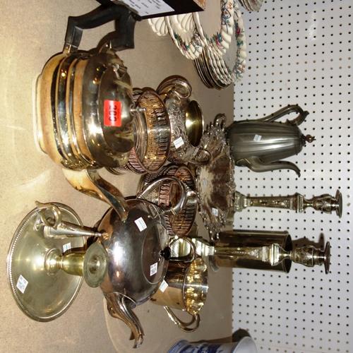 A quantity of silver plate, including candlesticks, tea pots, chamber sticks and sundry. (qty)
