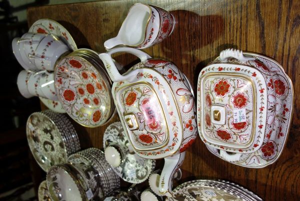 An early 19th century red and gilt Imari style part tea set. (qty)
