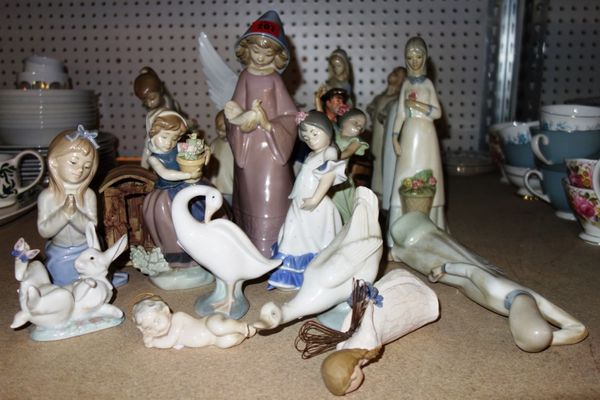 A quantity of 20th century Lladro, Nao and other similar style figures. (qty)