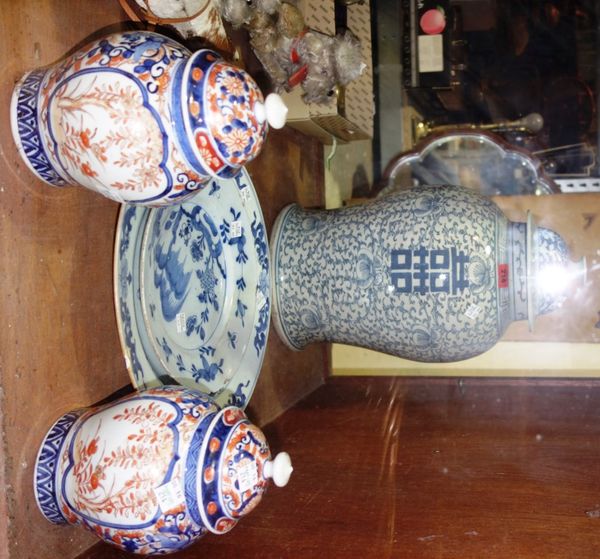 A large Oriental baluster vase and associated cover, together with a pair of Imari decorated vases and two blue and white Chinese plates. (5)
