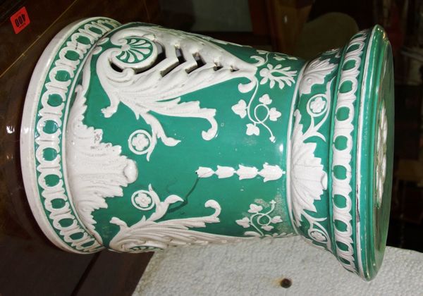 A green and white pottery garden seat, (1).