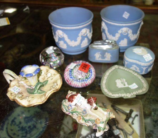 A Spode ceramic chamberstick with a naturalistic handle, a ceramic figure of a hound, two paperweights with millefiori decoration and a small group of