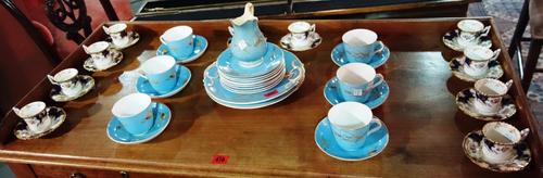 A Coalport blue and gilt decorated ten piece coffee set, together with a blue and gilt part tea set. (qty)
