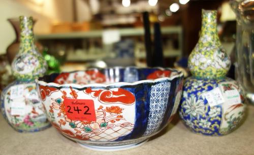 A group of Oriental ceramics, including; a pair of double gourd shaped vases, a group of blue and white plates and sundry. (qty)