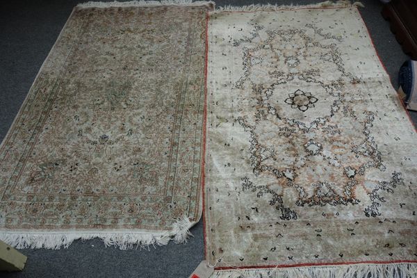 Two Turkish silk rugs. (2)