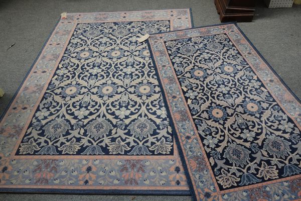 Two machine made William Morris style rugs. (2)