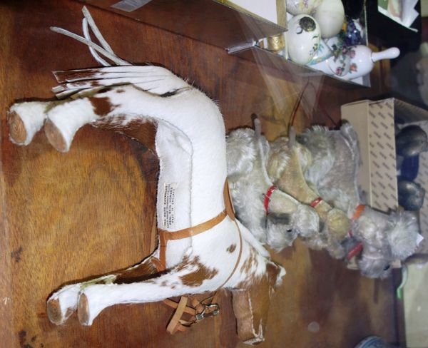 Edith Reynolds; a real horse skin model of a horse and three 20th century toy dogs. (4)