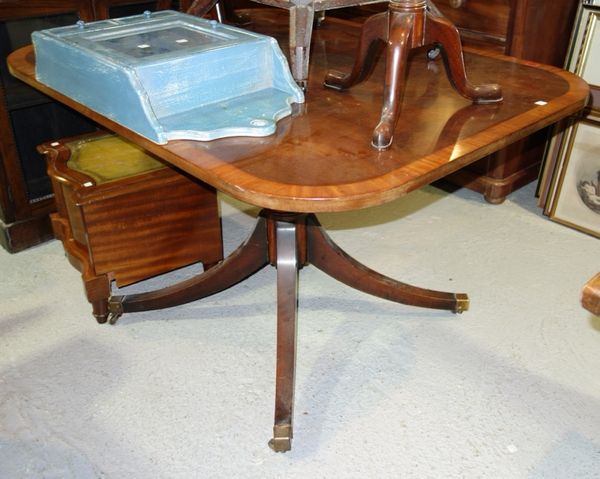 A mahogany rectangular pedestal dining table, 122cm wide.