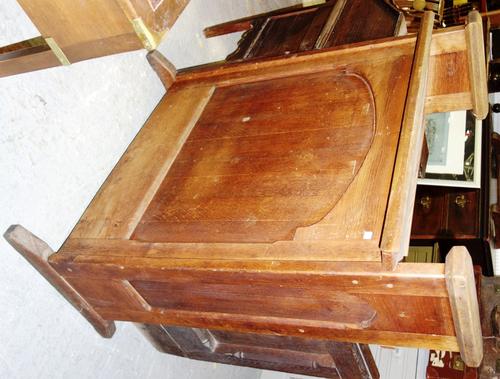 An early 20th century oak lectern, 93cm wide.