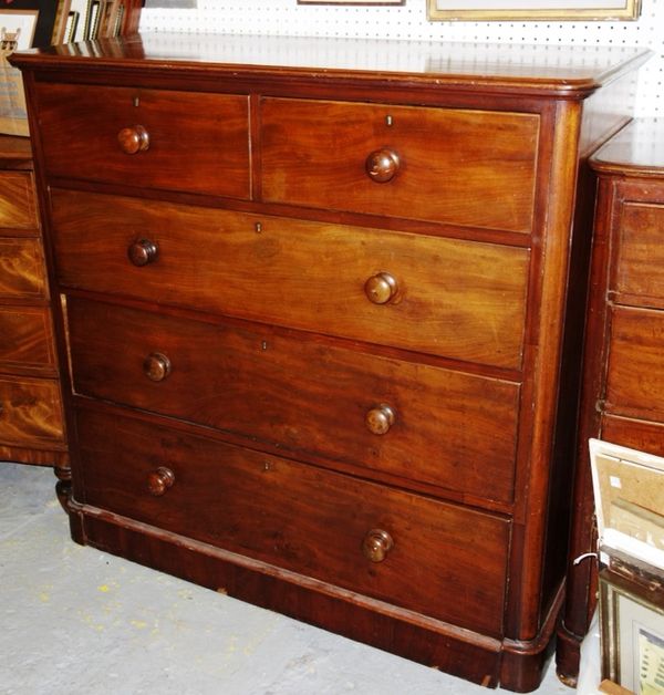 A 19th century chest of two short and three long graduated drawers, on a plinth base, 122cm wide.