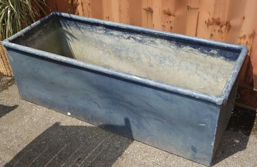 A pair of blue painted farm troughs, 120cm long. (2)