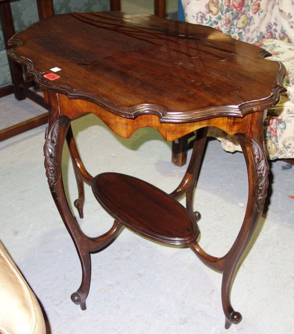 An Edwardian shaped mahogany occasional table with platform undertier, together with an oak tripod table. (2)