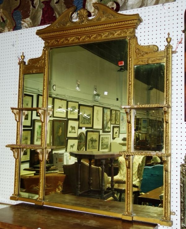 A large 19th century gilt framed overmantel mirror with integral shelves, 120cm wide x 139cm high.