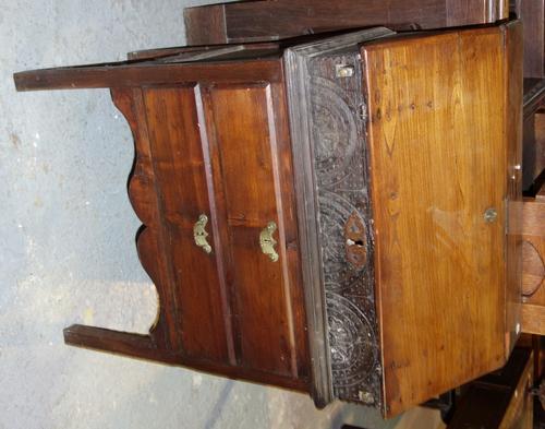 An early 18th century oak bible box on a later stand, 64cm wide.