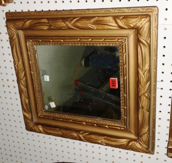 A rectangular gilt stepped wall mirror 45cm x 52cm.