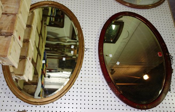 An oval gilt wall mirror and an oval chinoiserie wall mirror, the larger 83cm wide x 62cm high. (2)
