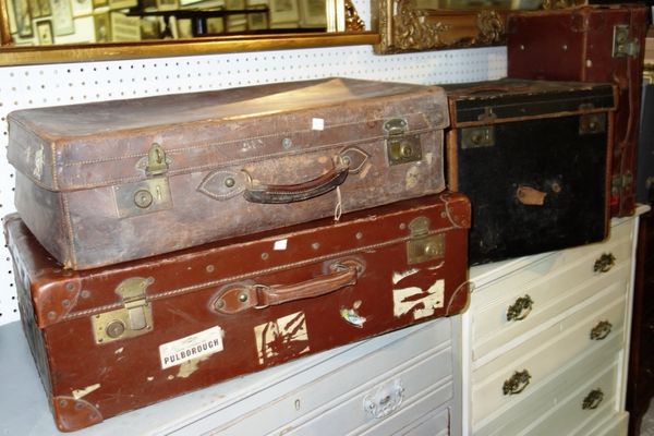 A group of four vintage leather cases. (4)