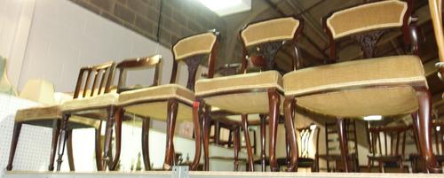 A group of five 19th century and later mahogany and walnut chairs. (5)
