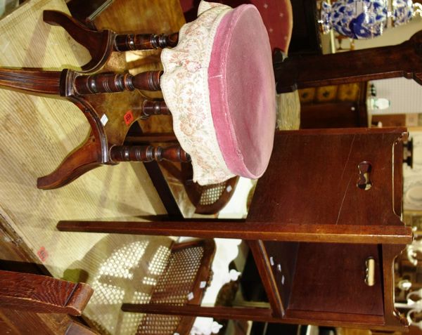 An Edwardian walnut circular stool and a mahogany night stand. (2)