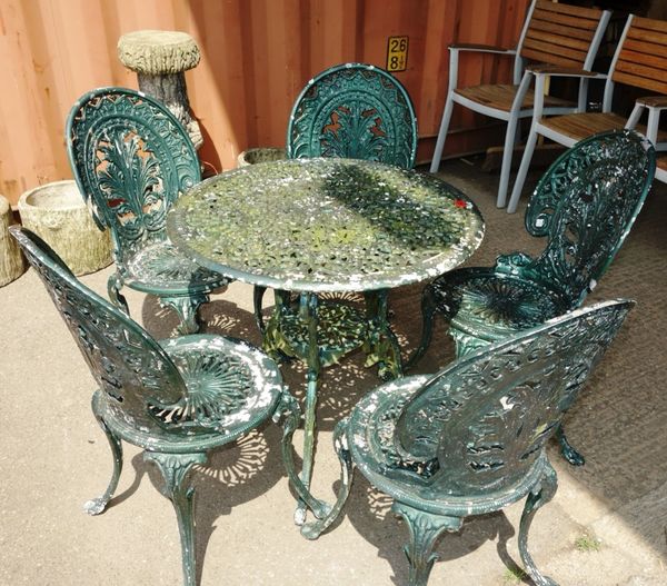 A 20th century green painted aluminium garden table and chair. (2)