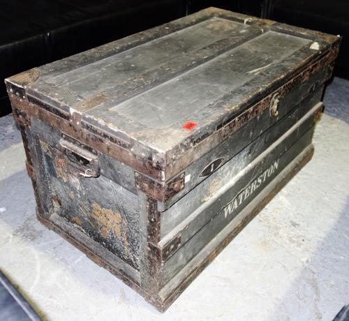 A stained pine and metal bound trunk, 91cm wide.