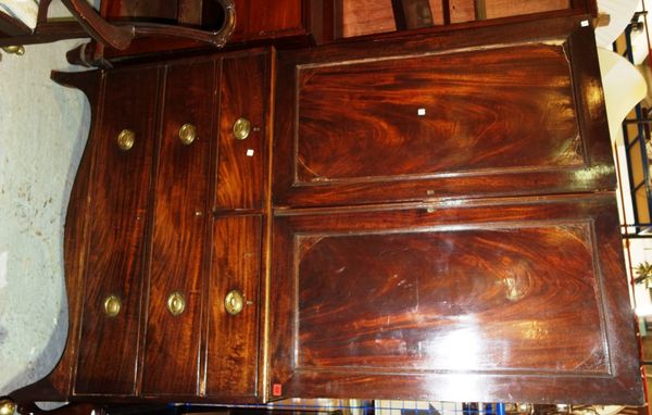 A 19th century mahogany linen press, with pair of panelled doors over two short and two long drawers, 120cm wide.