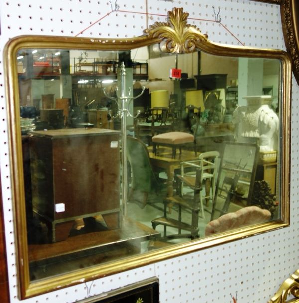 A gilt framed overmantel mirror with shell surmount, 94cm x 69cm.