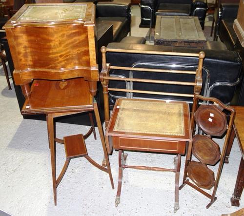 An Edwardian satinwood inlaid foldover card table, together with a mahogany towel rail, a cake stand, a 20th century leather top sofa table and a comm