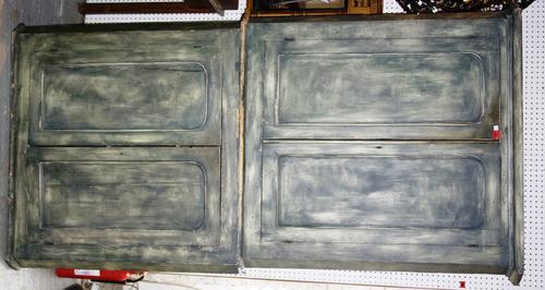 A George III (later green painted) pine floor standing double height corner cupboard, on plinth base, 116cm wide x 215cm high.