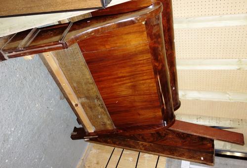 An early 19th century French mahogany lit en bateau/bed, with rollover ends, 117cm wide.