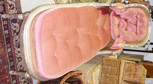 A Louis XVI style silver painted tub back chaise longue on tapering fluted supports, 170cm wide.