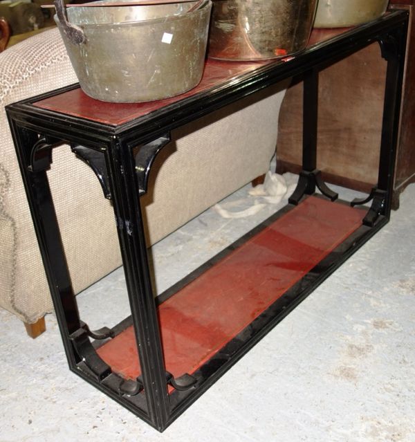 A 20th century black lacquer leather inset rectangular console table with concave corner mounts 120cm wide.