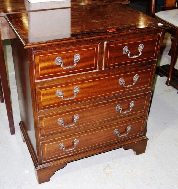 A 19th century mahogany side table with single drawer, together with a 20th century chest of two short and three long drawers, 63cm wide.