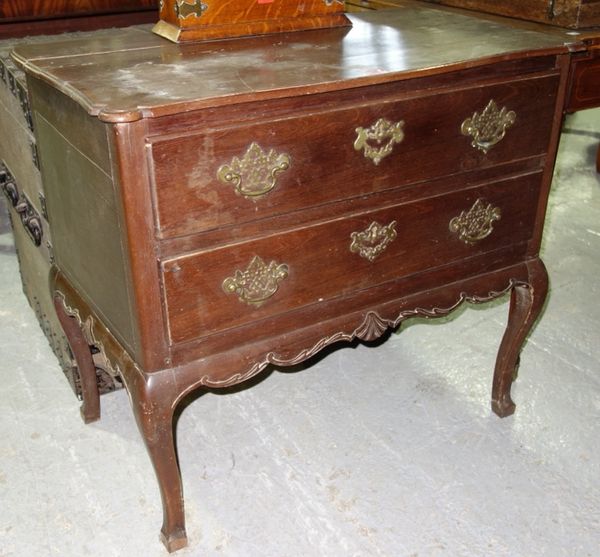 A 19th century Continental walnut two drawer side table, on cabriole supports, 84cm wide.