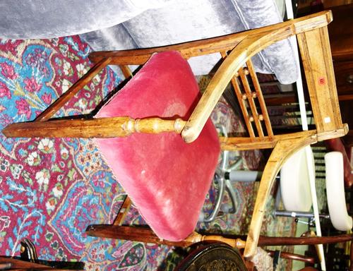 A 19th century walnut framed open armchair.