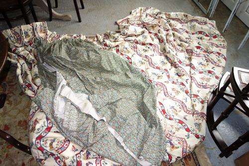 A Chinese curtain, 201cm drop, together with two leaf pattern curtains, 134cm wide x 152cm drop. (3)
