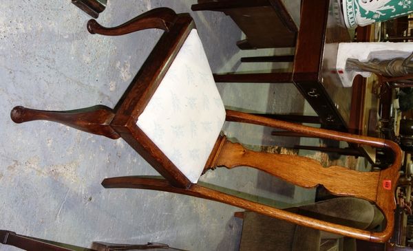 A set of four vase back oak dining chairs. (4)