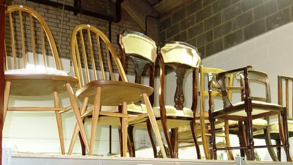 A pair of Ercol stick back side chairs, together with an Edwardian mahogany inlaid corner chair. (3)