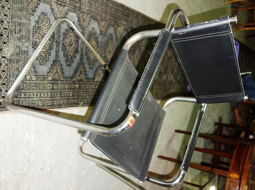 A set of four 20th century Marcel Breuer style chrome and leather armchairs, together with two brown leather and chrome chairs. (6)