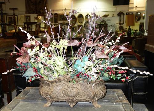 A cast iron oval jardinière, a pair of copper and glass lanterns, two sets of scales and two iron hanging hooks, (8).