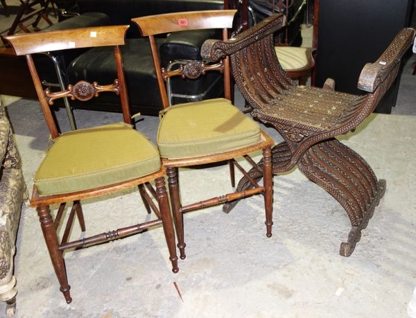 A pair of 19th century rosewood bedroom chairs, and a hardwood folding armchair. (3)