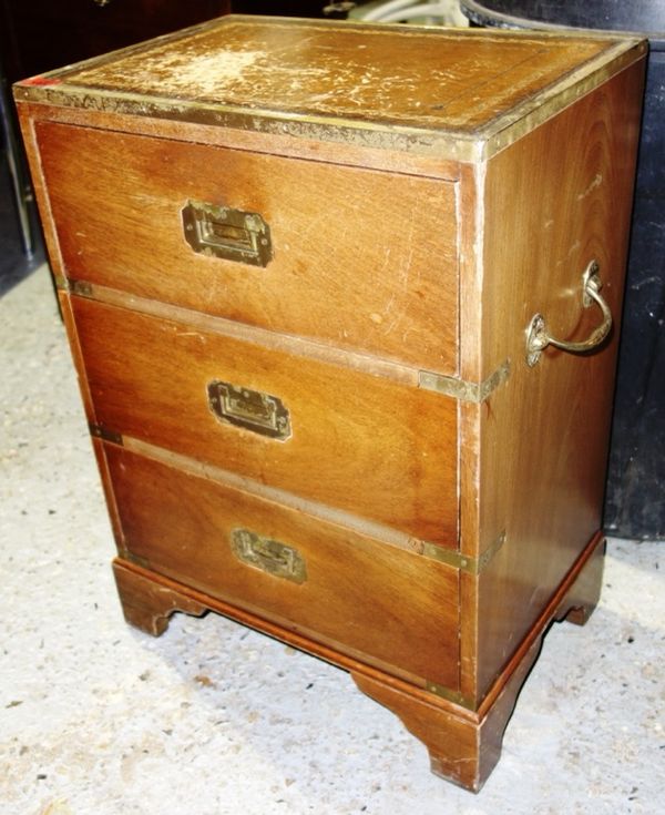 A 20th century mahogany campaign style three drawer chest, 44.5cm wide.