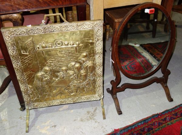 A mahogany oval swing frame toilet mirror, together with a brass fire screen. (2)