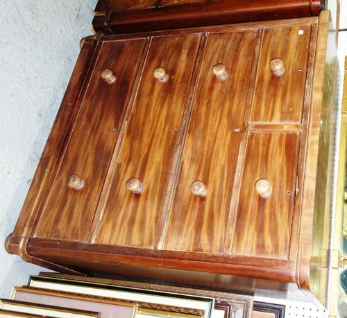 A 19th century mahogany chest of two short and three long graduated drawers, on bun feet, 107cm wide.