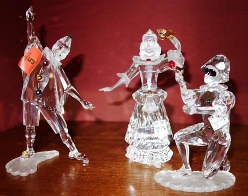 A group of three 20th century Swarovski crystal 'Masquerade' models; 'Pierrot', 'Harlequin' and 'Columbine'. (3)