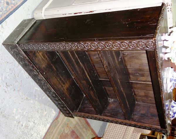 A Victorian carved oak bookcase, 107cm wide.