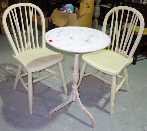 A pair of yellow painted stick back scullery chairs, and a grey painted wine table. (3)