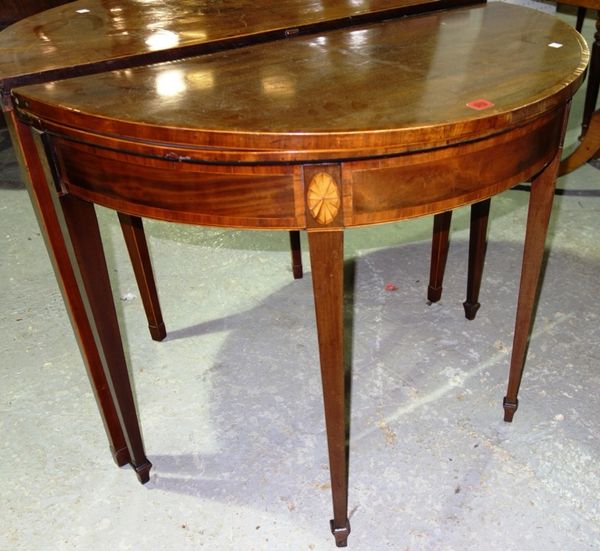 A George III mahogany rosewood banded demi lune foldover card table, 91cm wide.