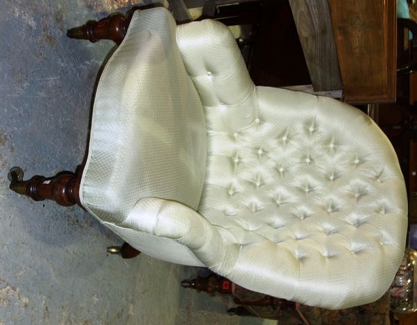 A Victorian white upholstered button back nursing chair. (1)