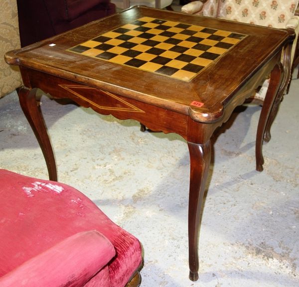 A 20th century walnut games table on cabriole supports, 81cm wide.